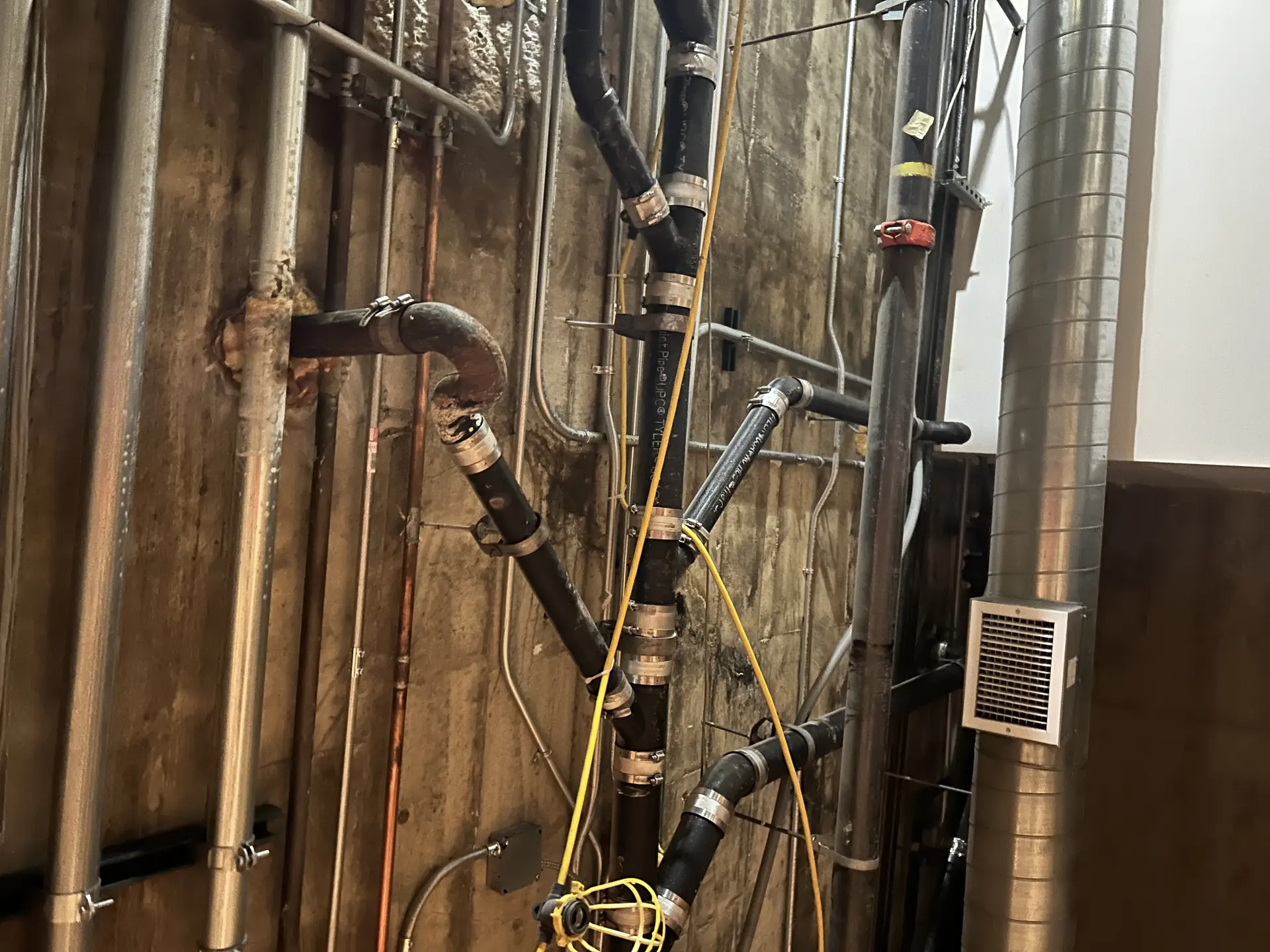 Professional plumbing work by Redline Construction team